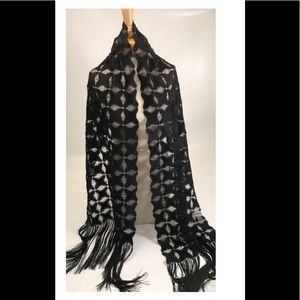 Very elegant shawl 74” x 15”-10 inch fringes. Reversible black/gray leather.